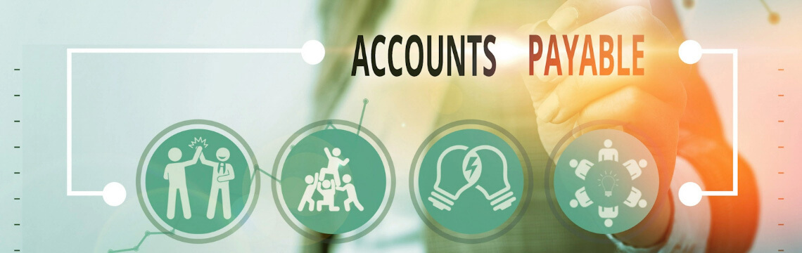 Business person pointing at a screen that says Accounts Payable