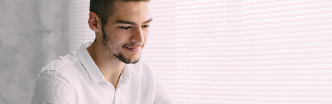 man-looking-at-papers