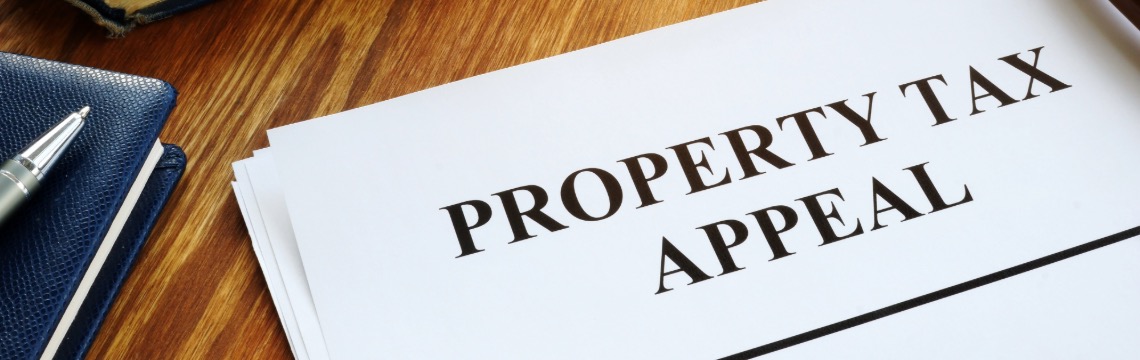 Property tax appeal and gavel on a table