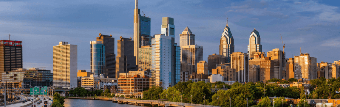 Pennsylvania local sales tax sourcing rules change October 2026 Philadelphia skyline at dusk.