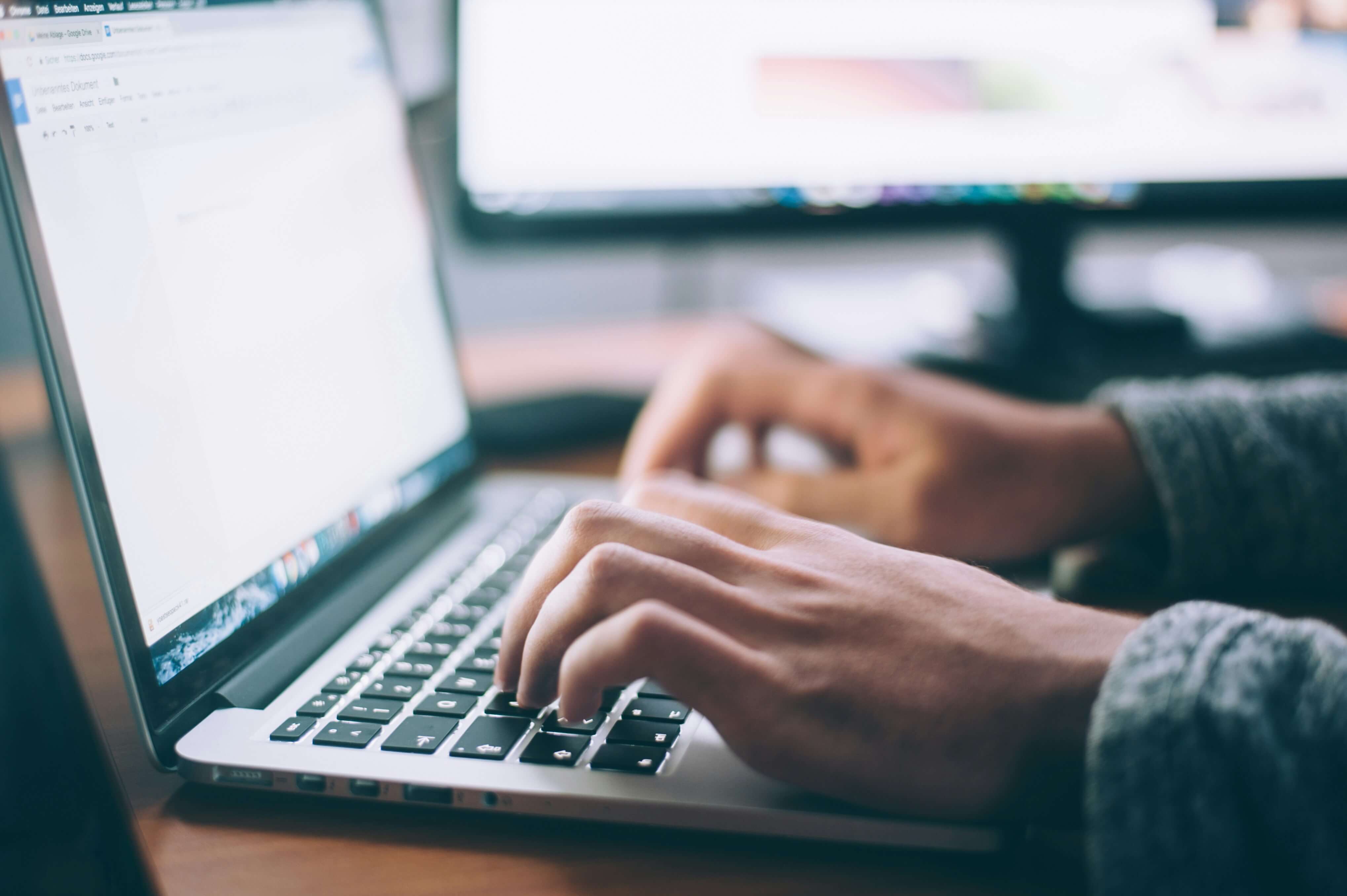 A person writing a document