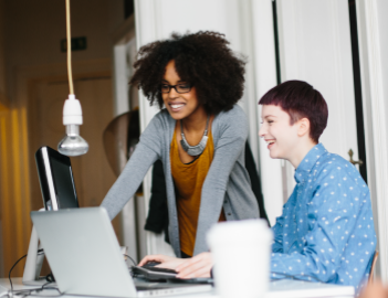 2 womens working on business